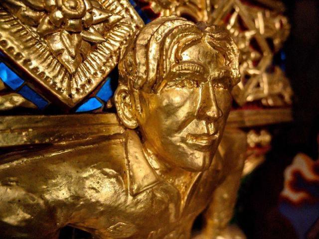 The temple worships both gold-plated David Beckham statues and Spider-Man and Batman